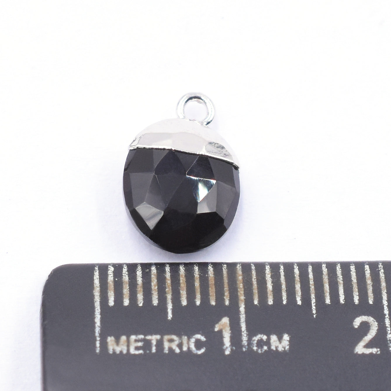 Black Onyx oval pendant in a sleek silver electroplated setting