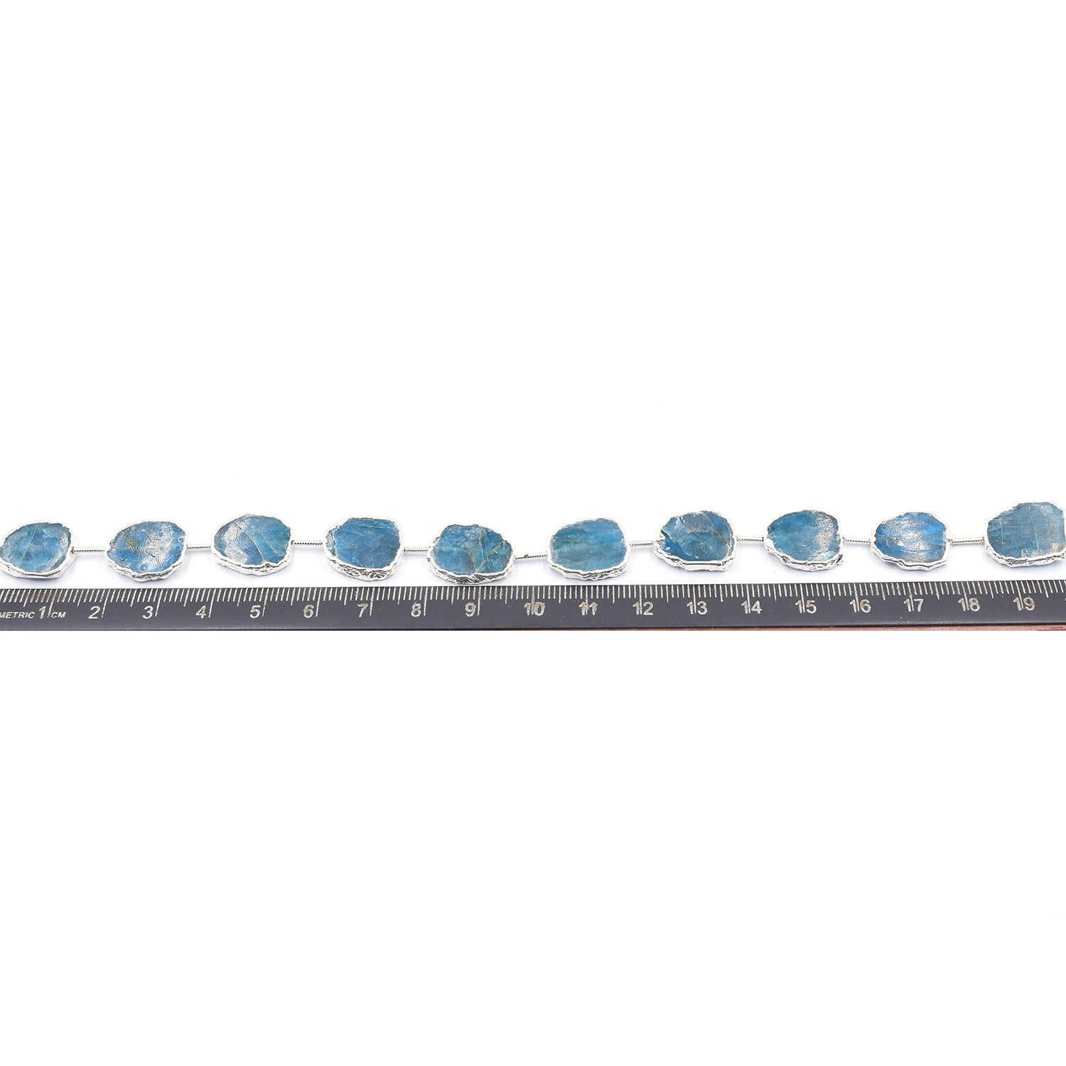 Gold electroplated Blue Apatite pendant in Uneven shape