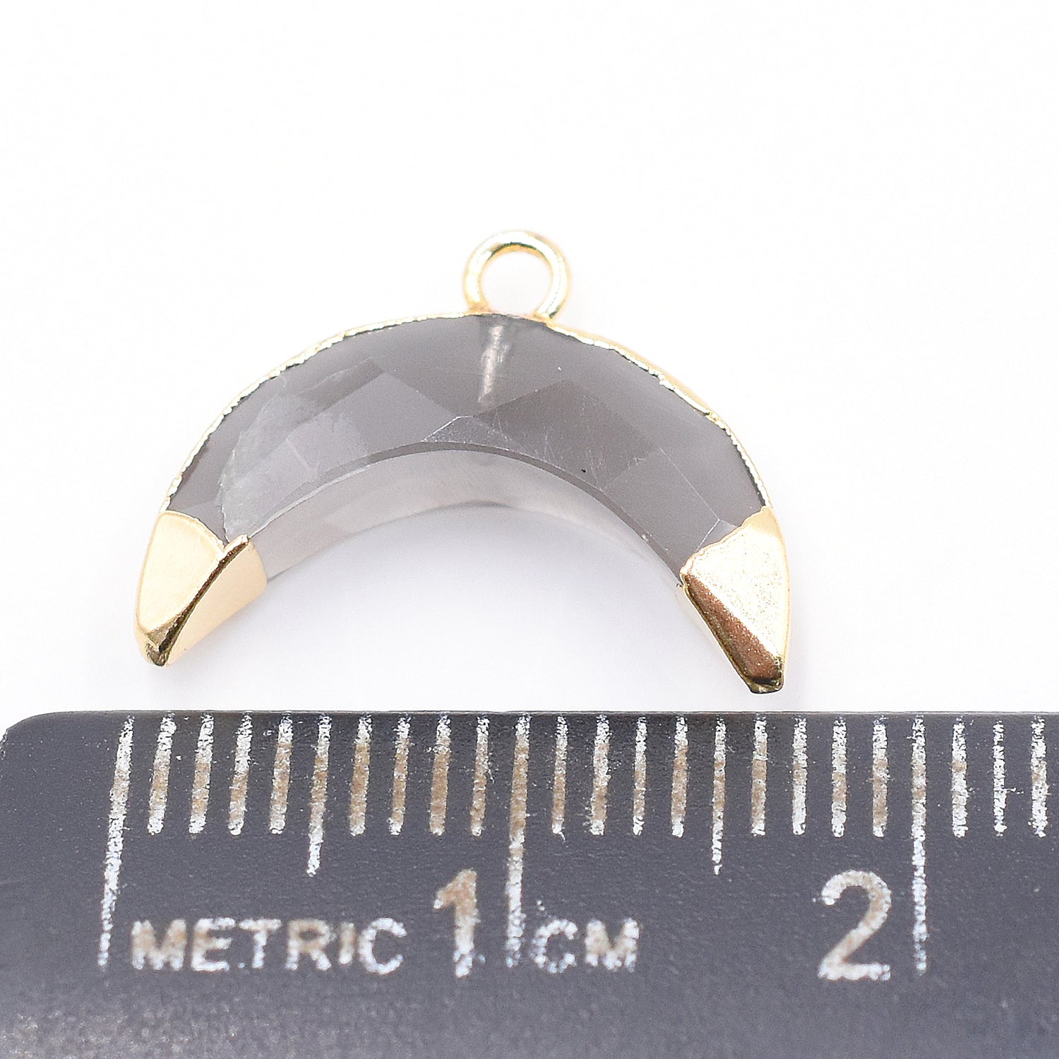 Elegant moon shaped Gray Moonstone pendant with gold trim