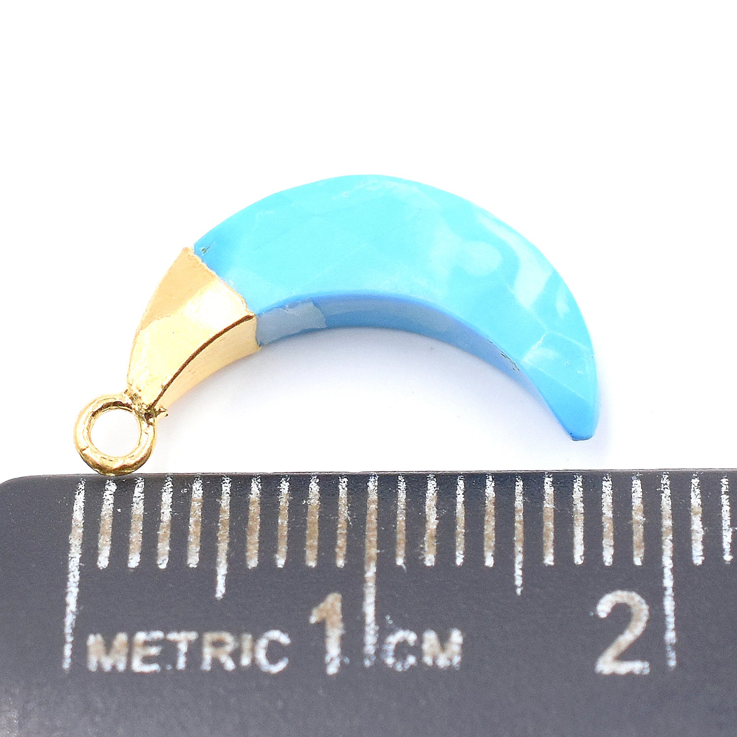 Elegant Howlite moon pendant in gold plating