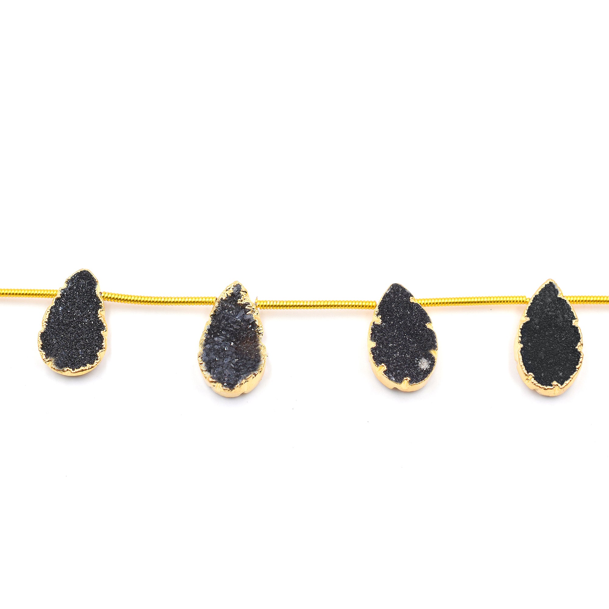 Unique black druzy stones with gold finish on a strand