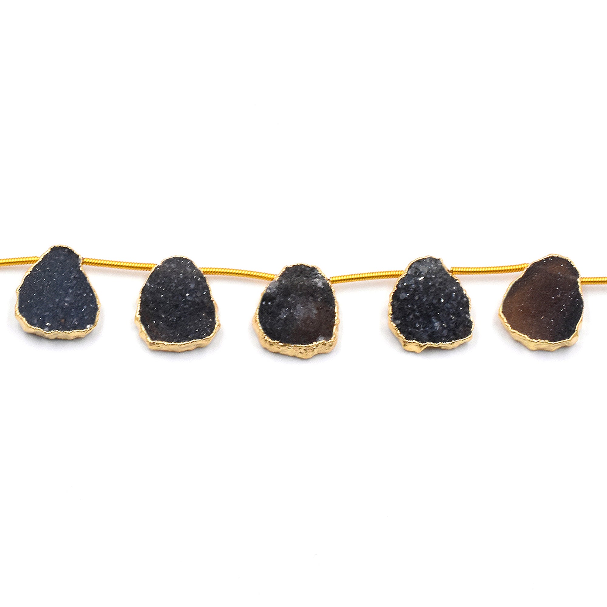 Unique black druzy stones with gold finish on a strand