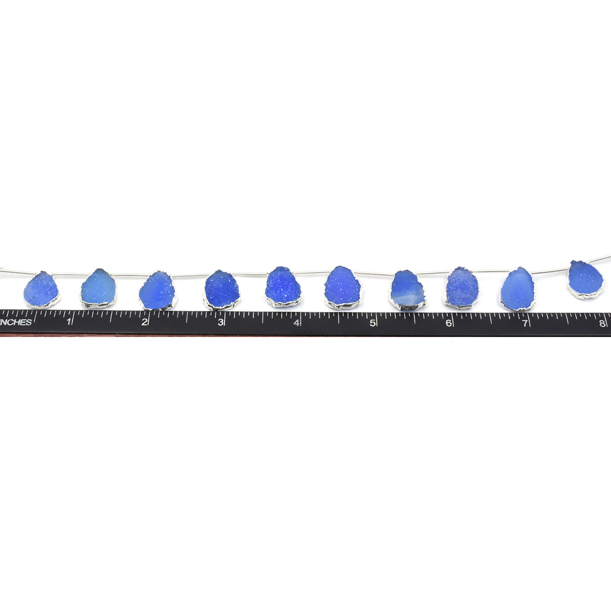 Elegant Blue Druzy Uneven shaped pendant with silver detailing