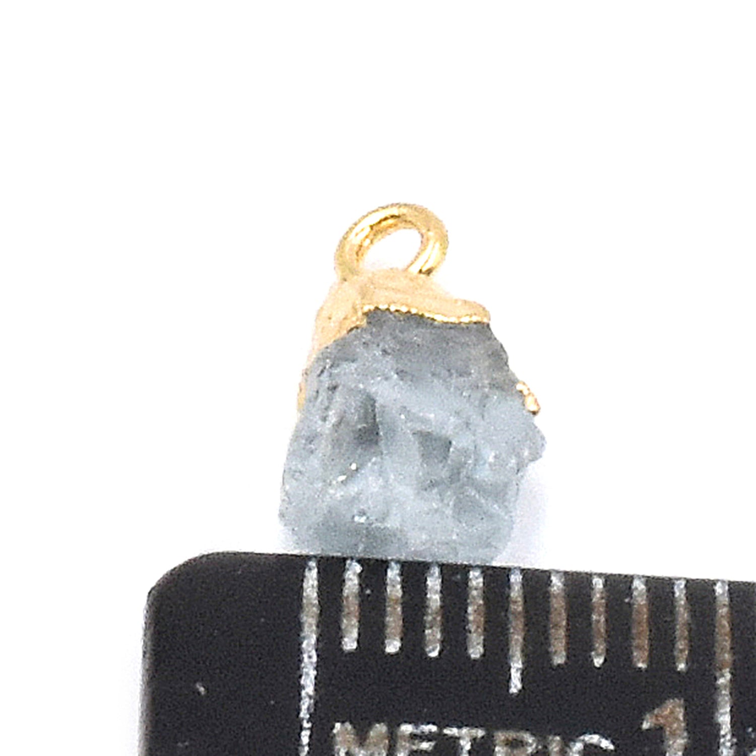 Stylish aquamarine Rough pendant in gold finish