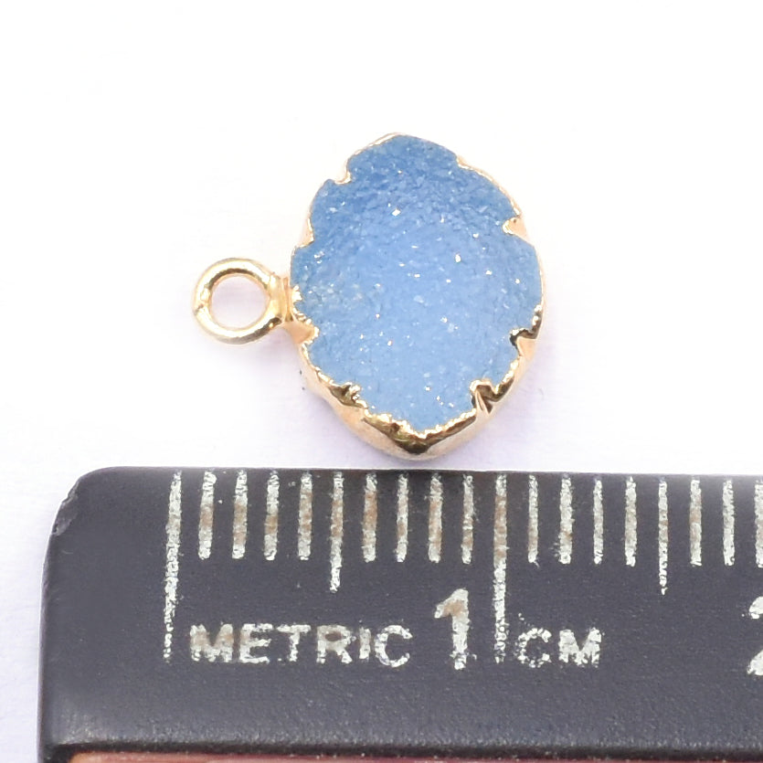 Elegant Blue Druzy marquis shaped pendant with gold detailing