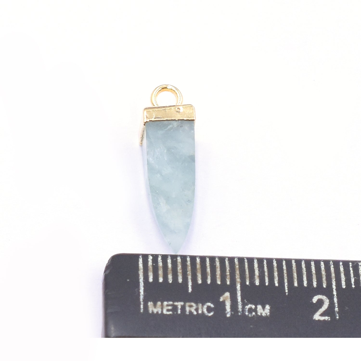 Stylish aquamarine Spike pendant in gold finish