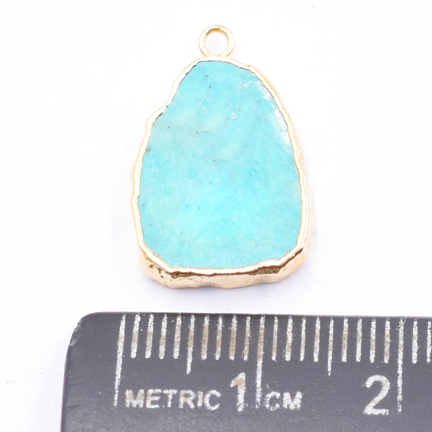 Elegant pear shaped Green Howlite pendant in gold