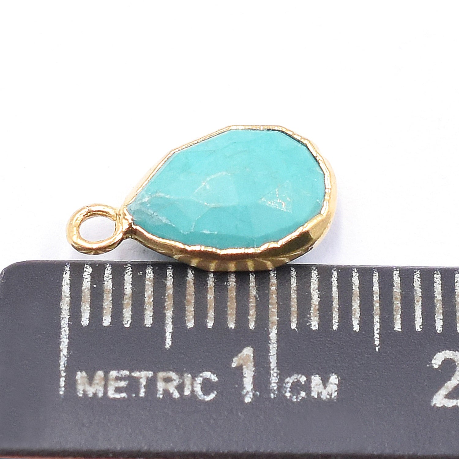 Gold electroplated pendant with Green Howlite pear design