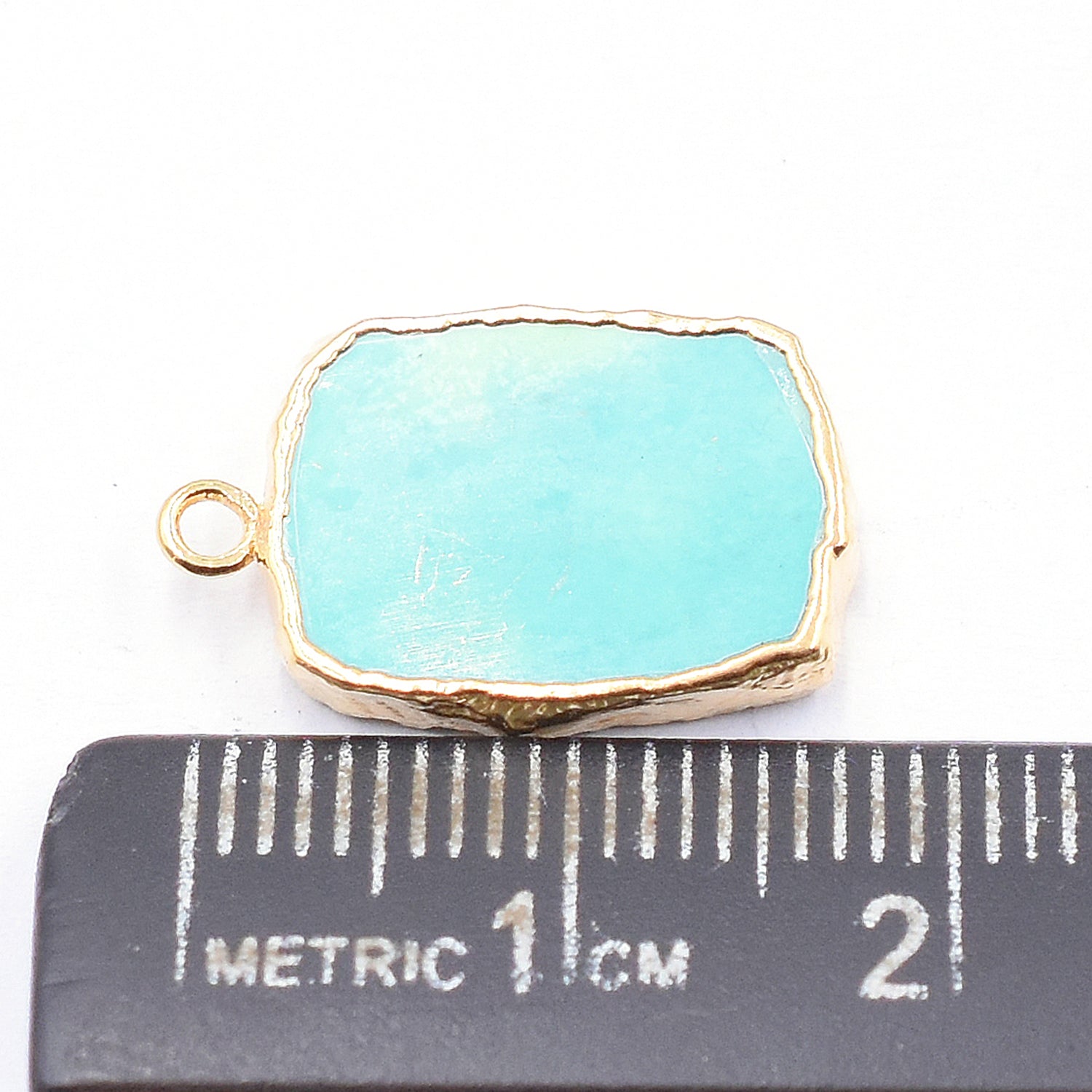 Gold electroplated pendant with Green Howlite Rectangle design