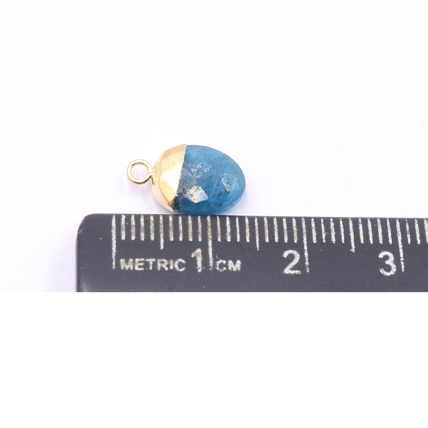 Gold electroplated Blue Apatite pendant in oval shape