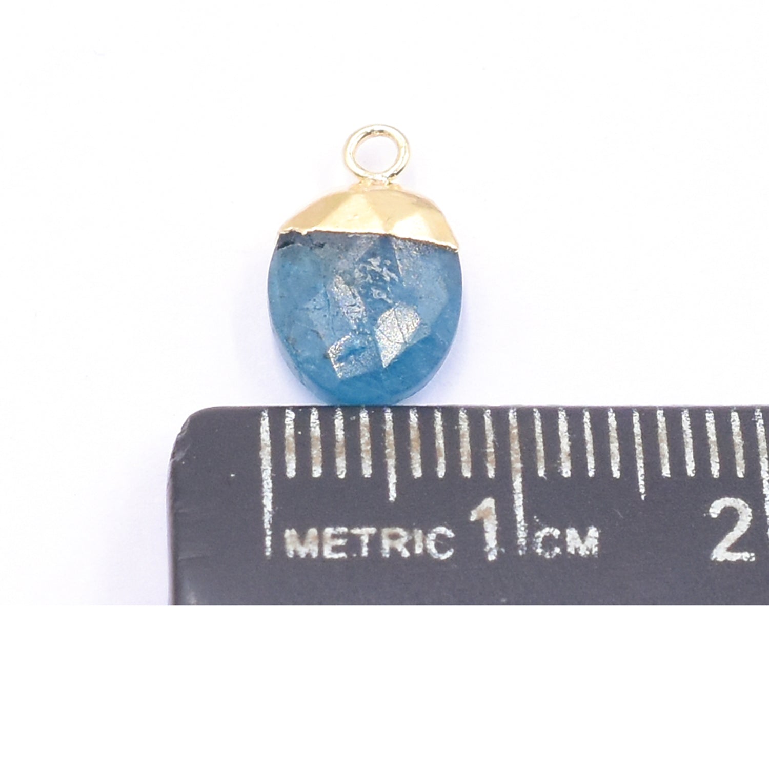 Vibrant Blue Apatite oval pendant with gold detailing