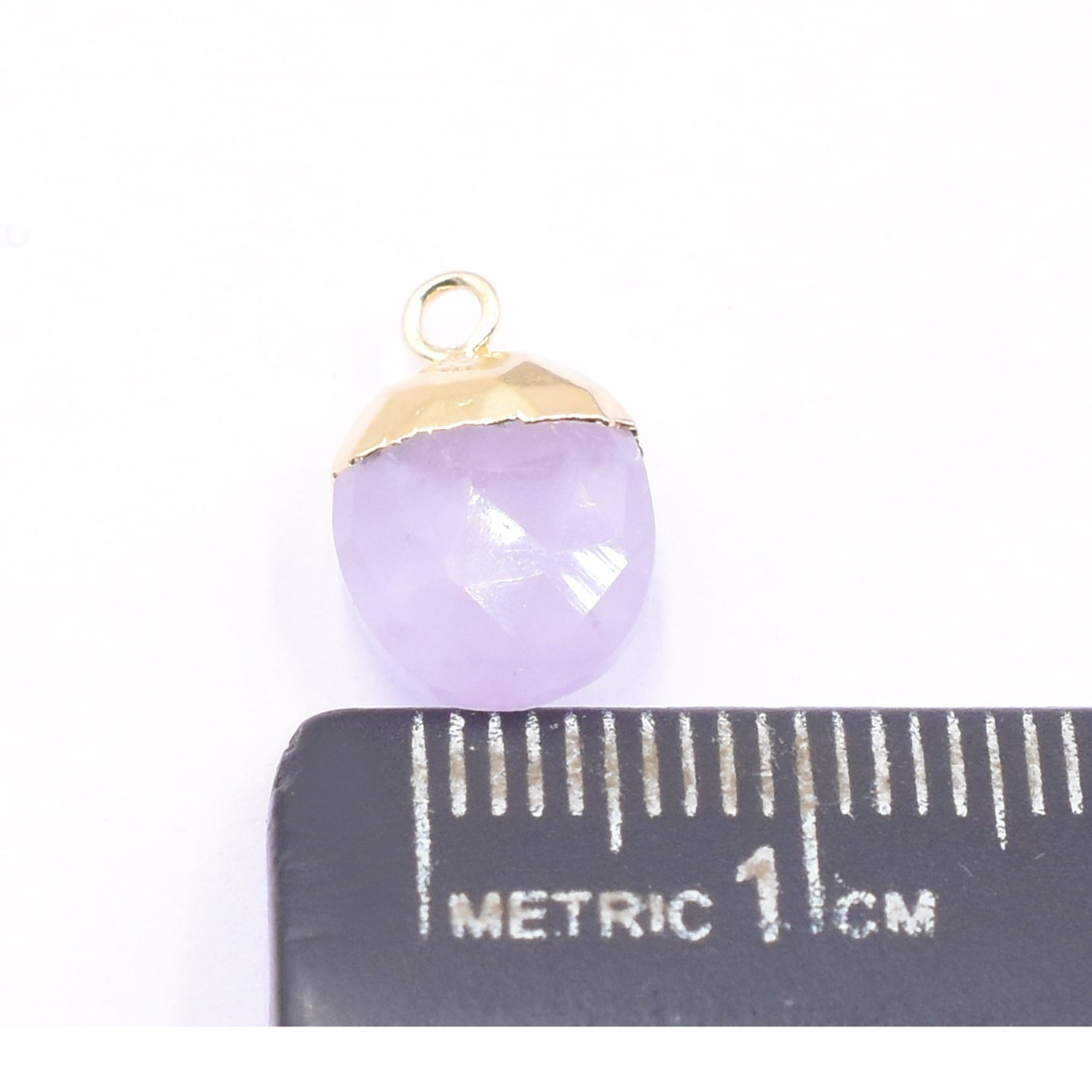 Beautiful amethyst onion shape pendant suspended from a delicate gold chain perfect for any occasion