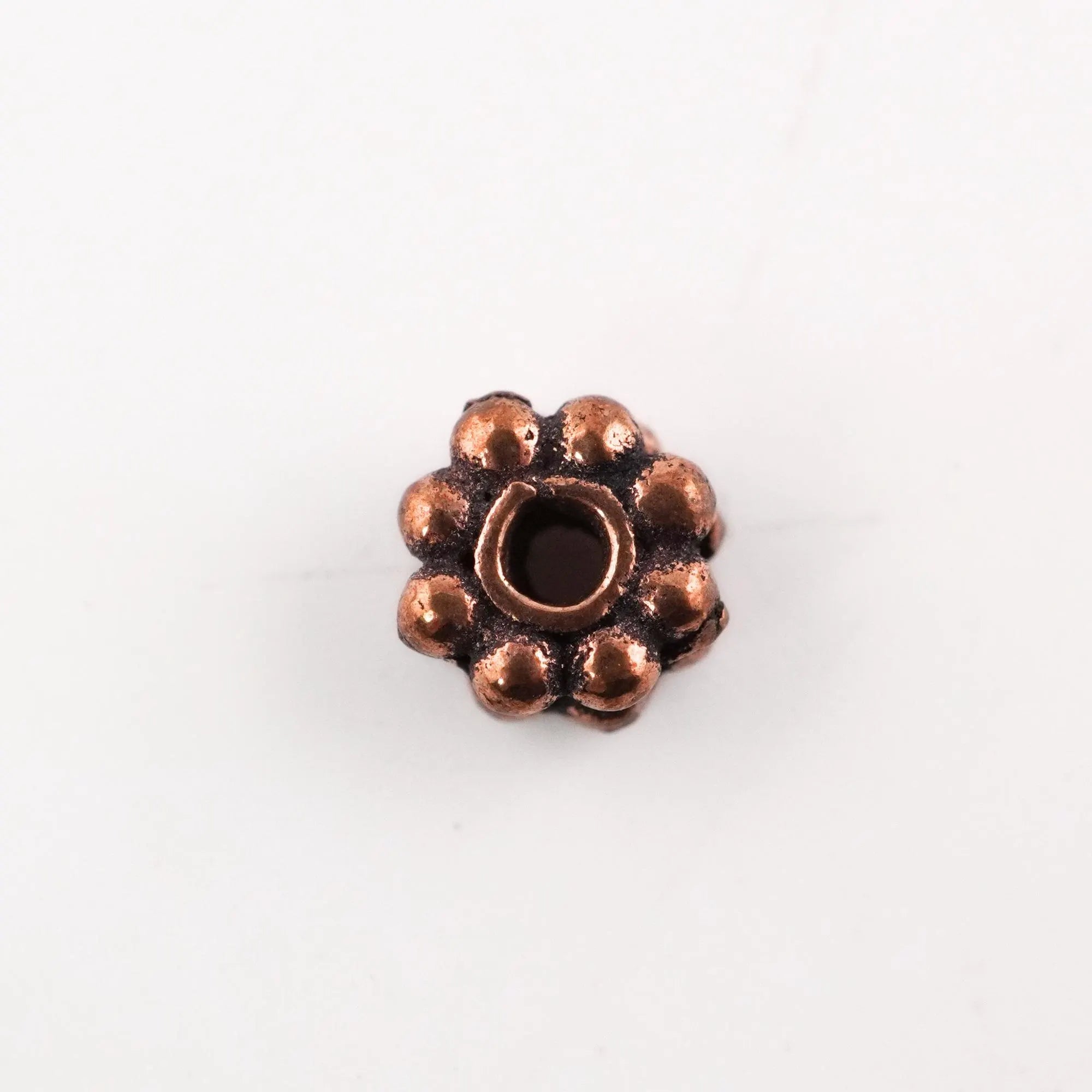 75 pcs flower-shaped copper beads

