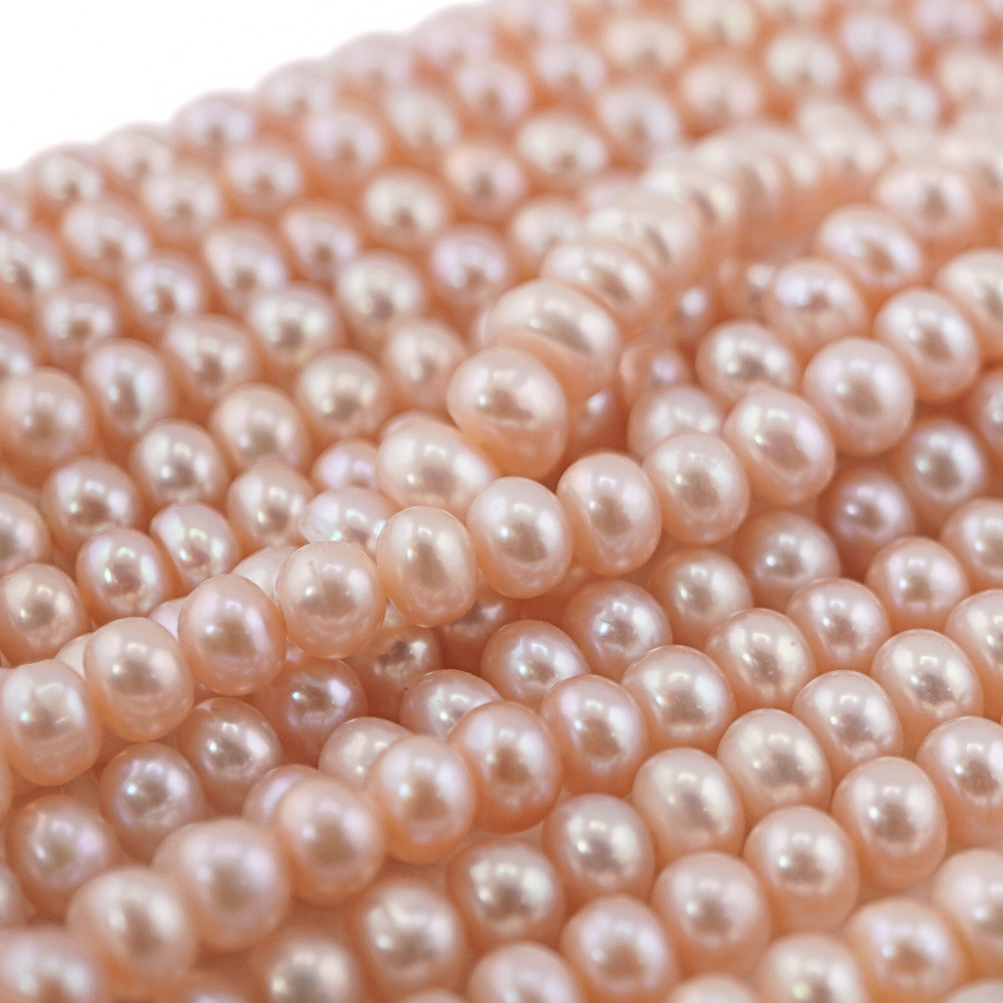 7x6 - 6 MM Peach Button Pearl Beads

