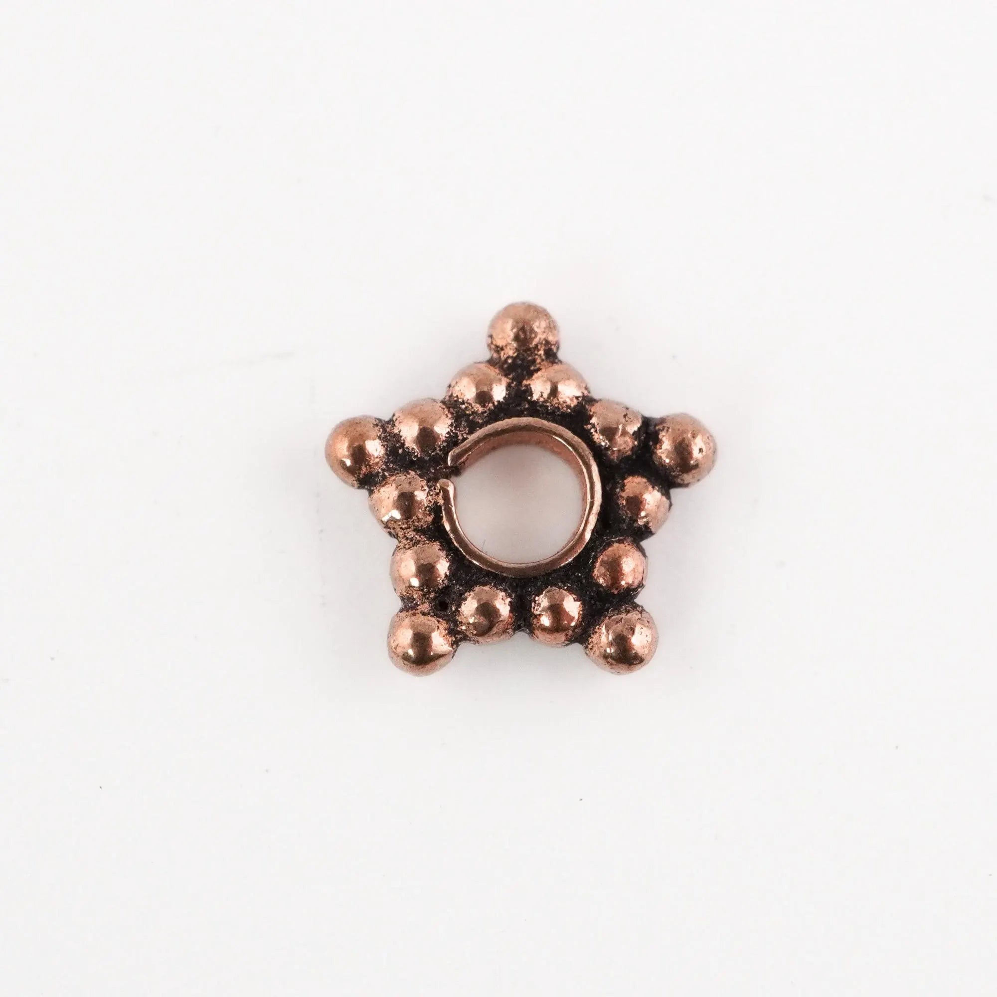 Antique copper star shape bead spacers

