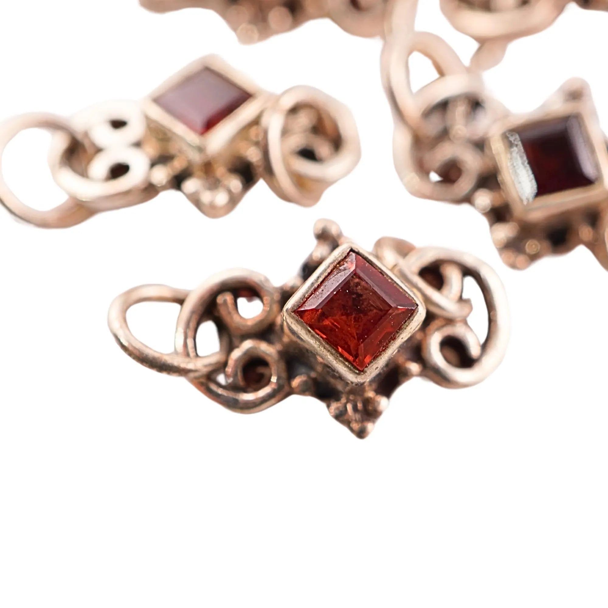 Antique silver link with red garnet

