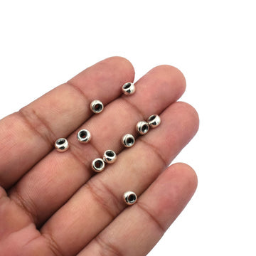 Disc-shaped sterling silver spacer beads

