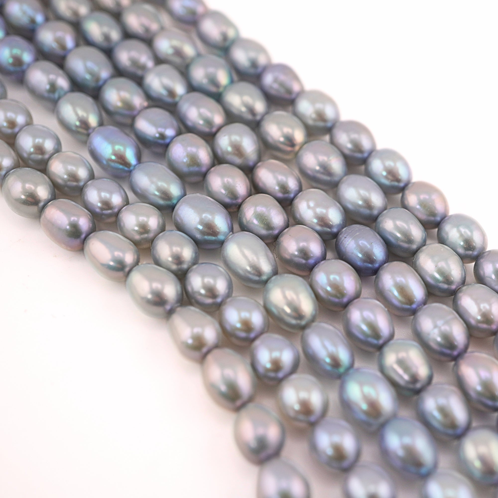 8 x 6 To 7 x 6 MM Lilac Rice / Oval Freshwater Pearls Beads