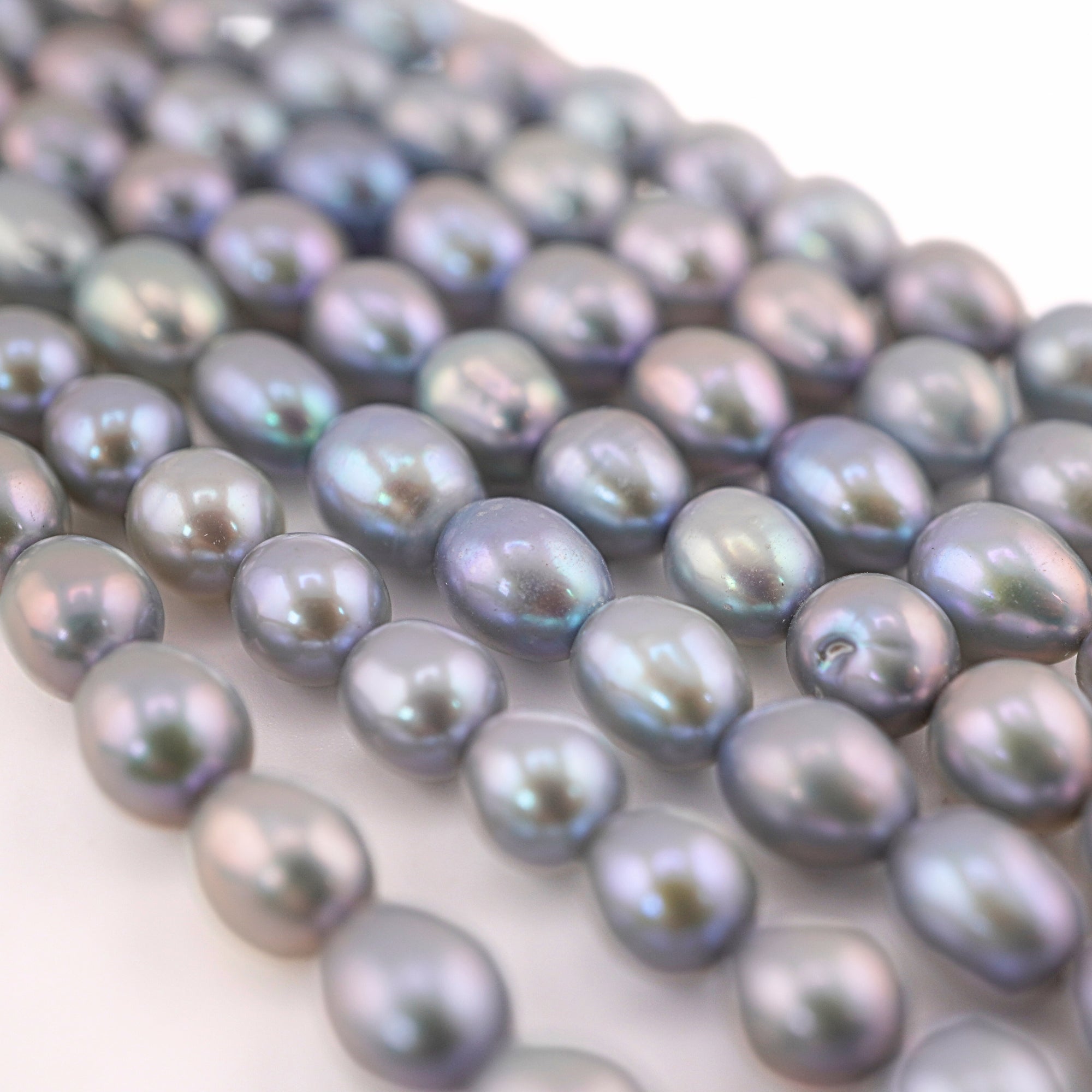 8 x 6 To 7 x 6 MM Lilac Rice / Oval Freshwater Pearls Beads