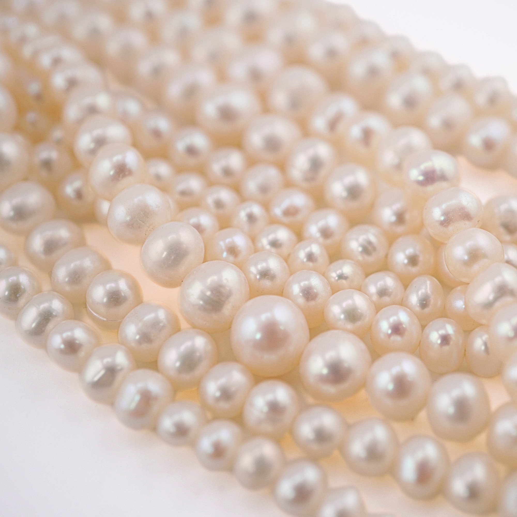 White Near Round Freshwater Pearls Beads