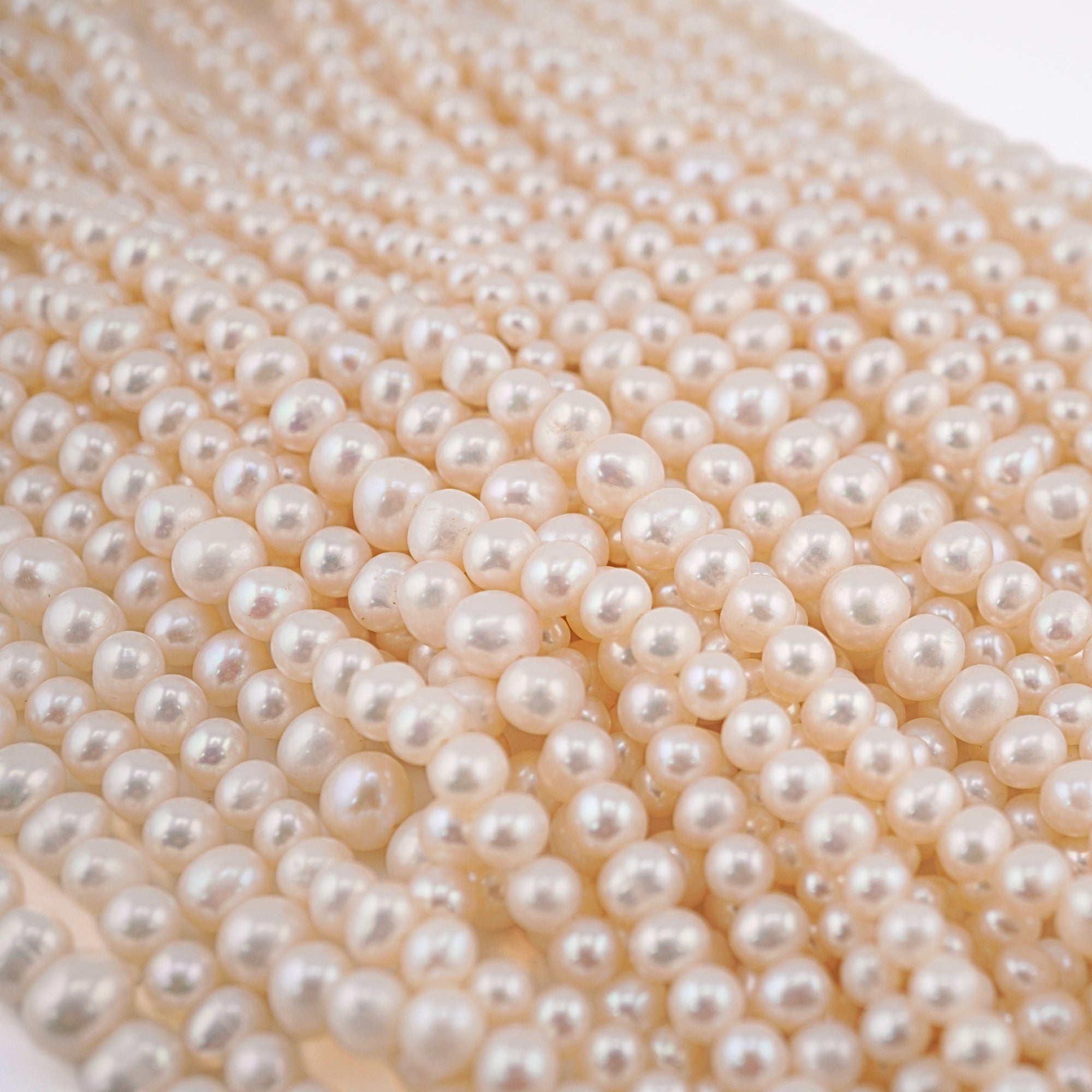 White Near Round Freshwater Pearls Beads