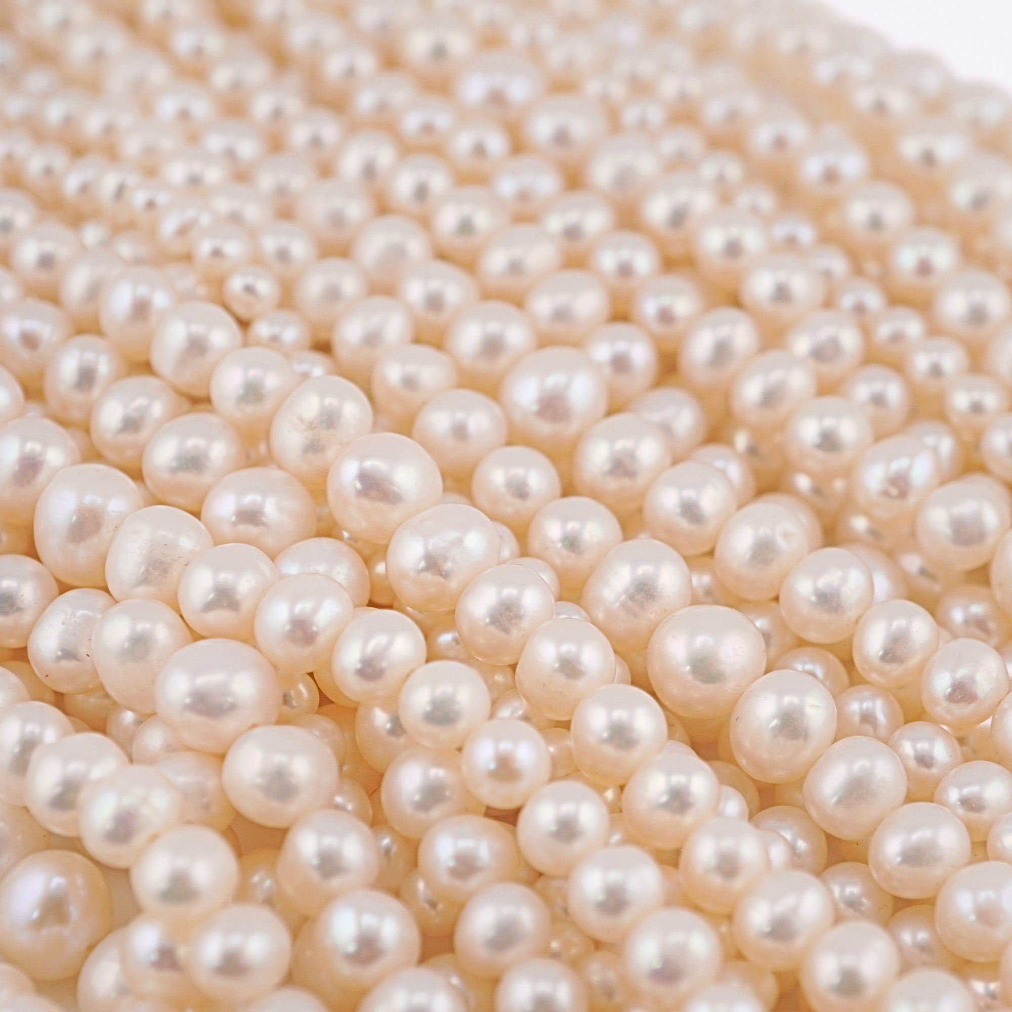 White Near Round Freshwater Pearls Beads