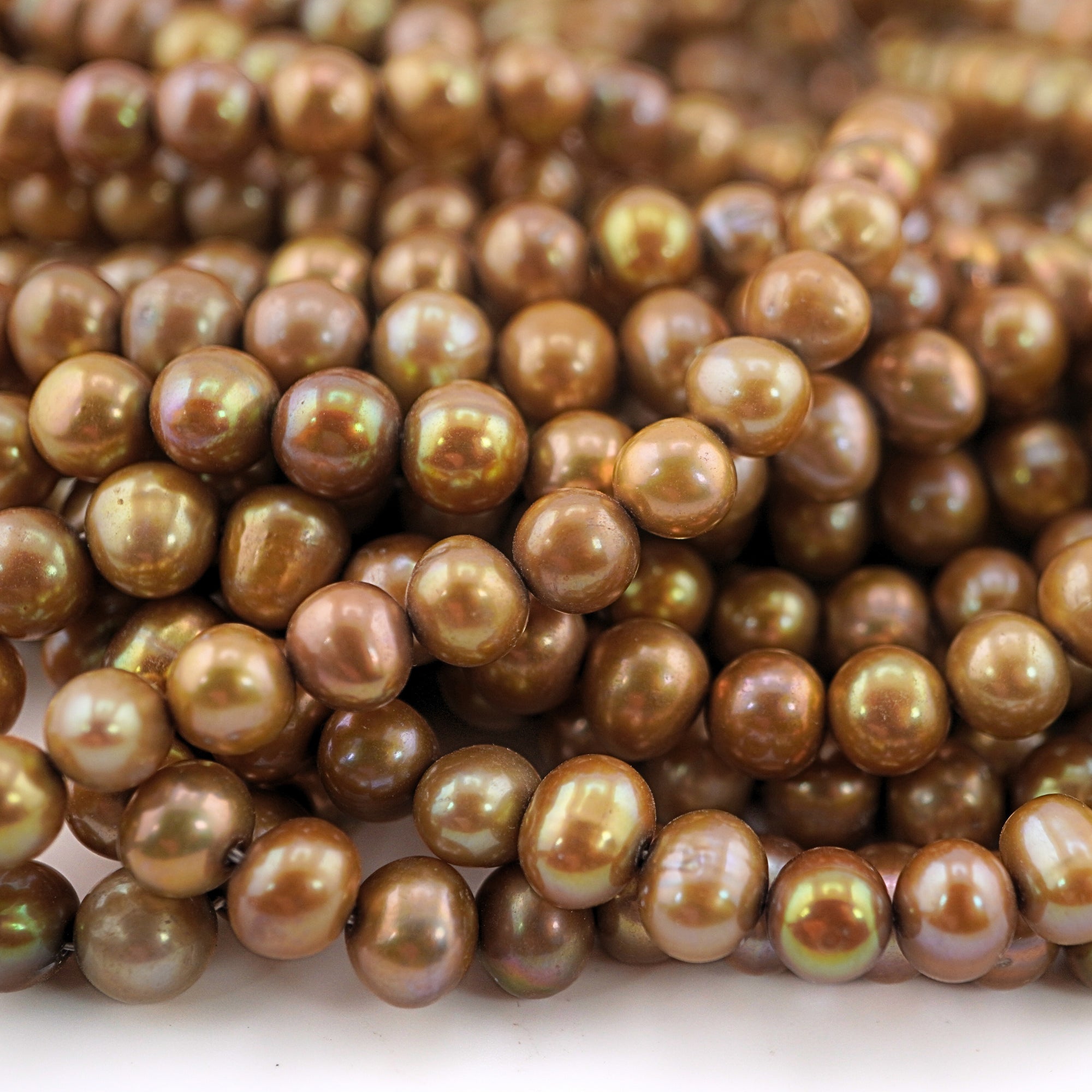 9 x 7 - 6 x 7 MM Golden Near Round Freshwater Pearls Beads