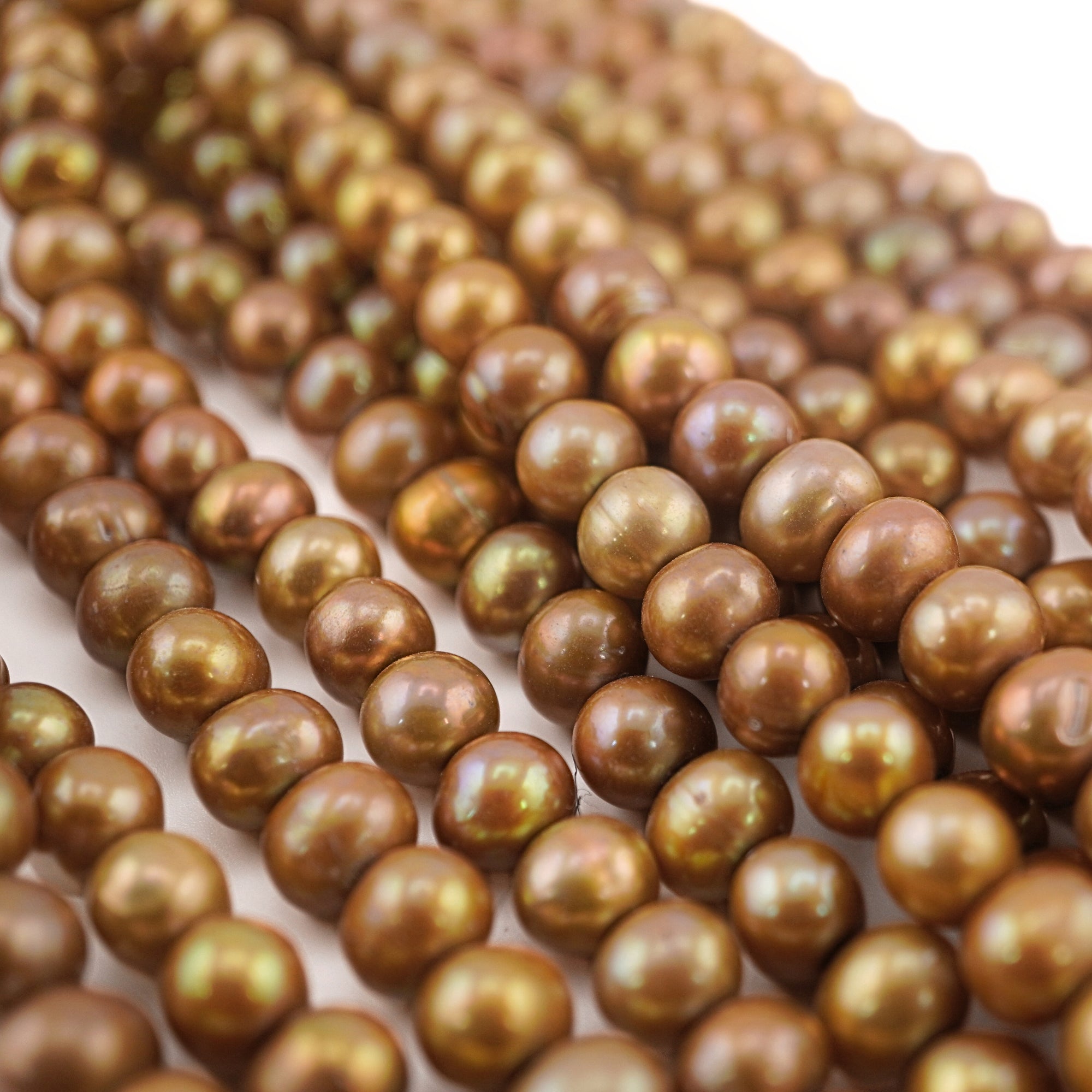 9 x 7 - 6 x 7 MM Golden Near Round Freshwater Pearls Beads