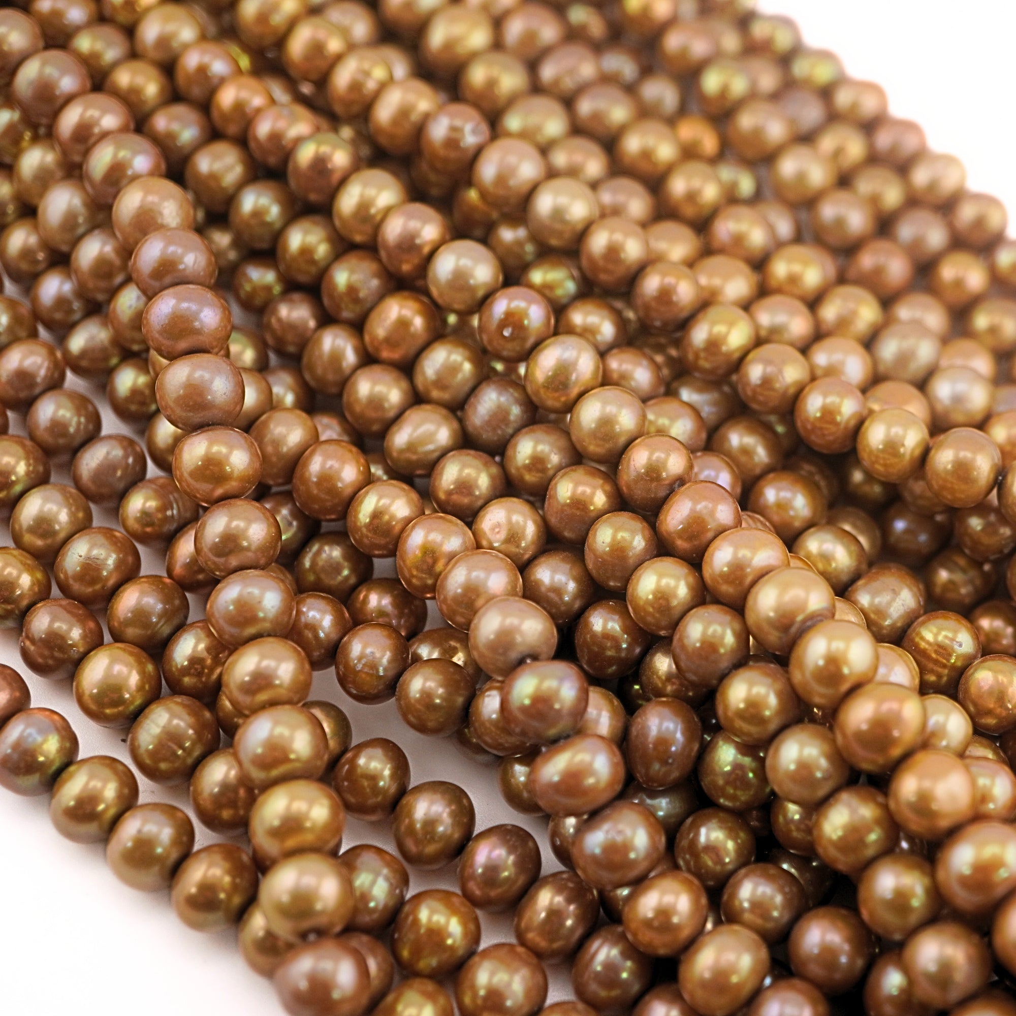 9 x 7 - 6 x 7 MM Golden Near Round Freshwater Pearls Beads