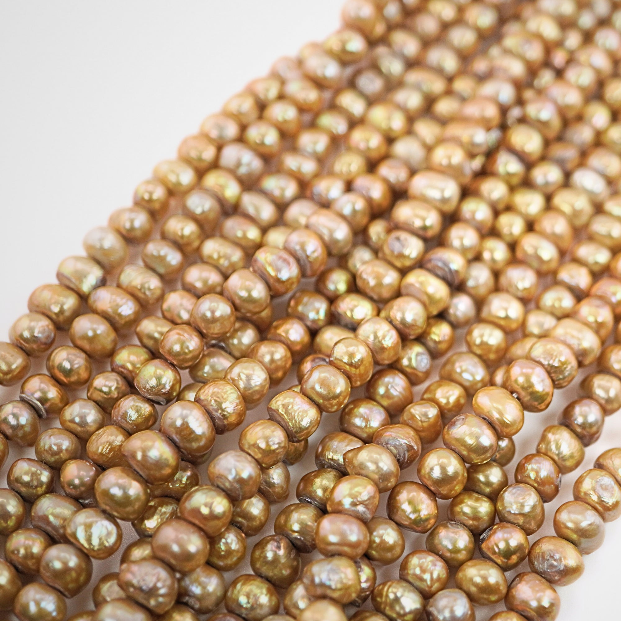 Golden Near Round Freshwater Pearls Beads