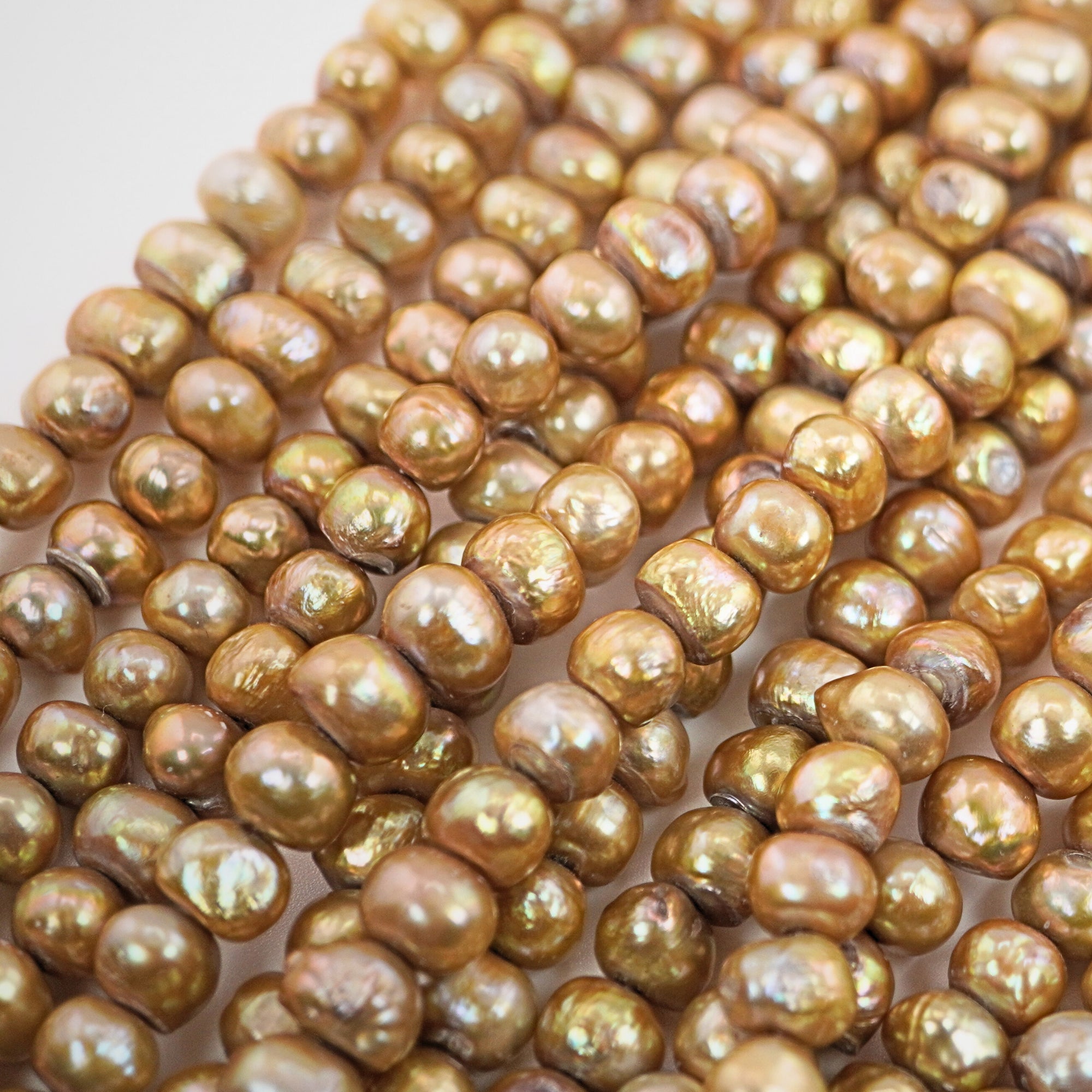 8 x 7 - 6 x 7 MM Golden Near Round Freshwater Pearls Beads