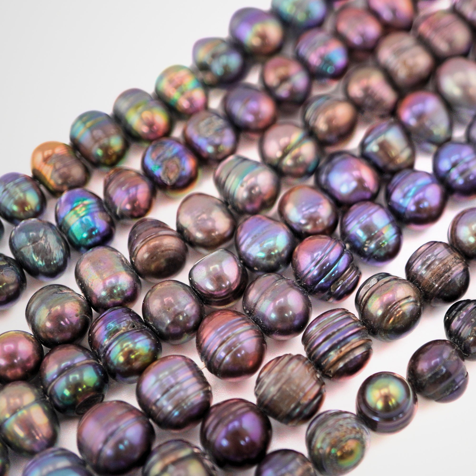 9 x 9 - 11 x 8 MM Peacock Oval Freshwater Pearls Beads