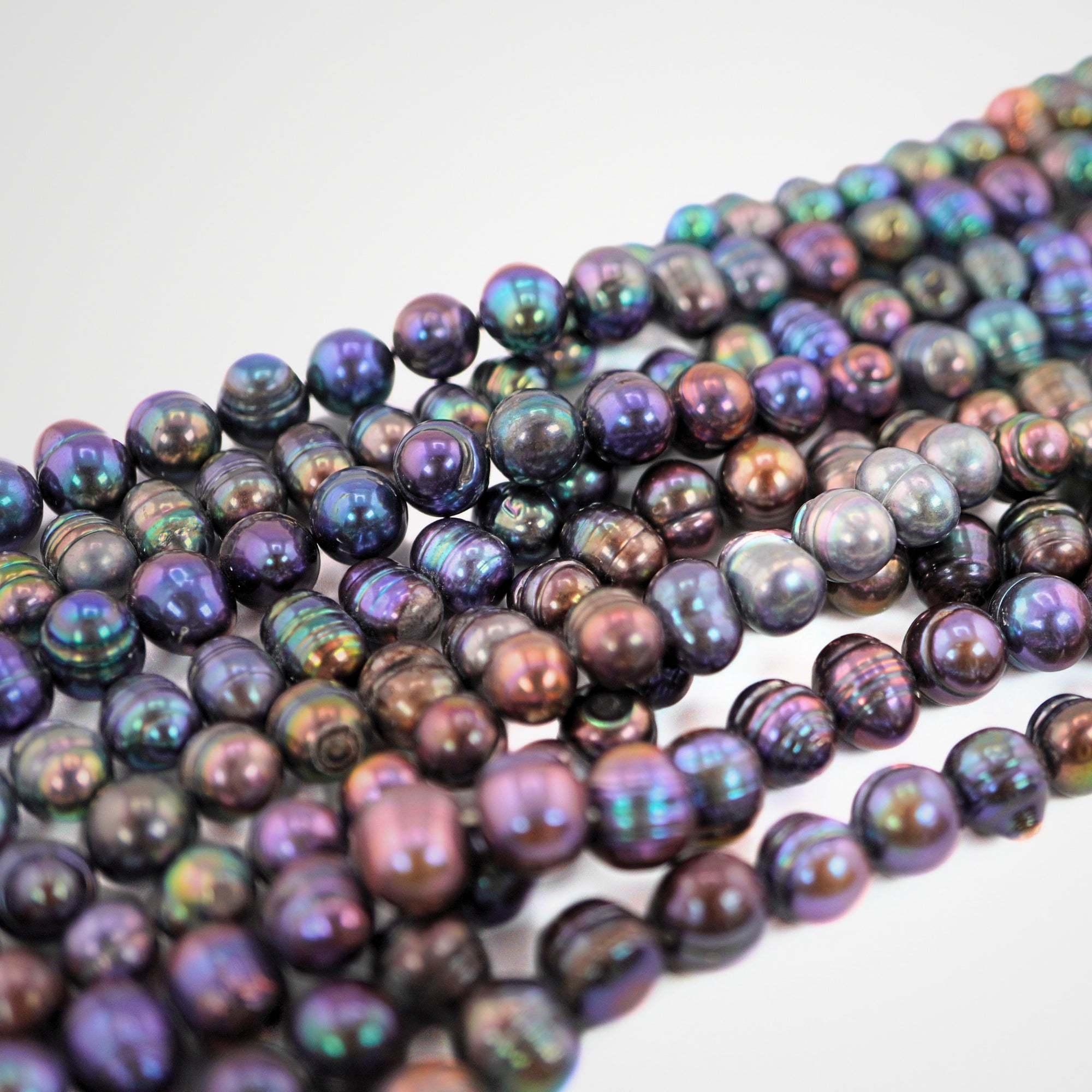 9 x 9 - 11 x 8 MM Peacock Oval Freshwater Pearls Beads