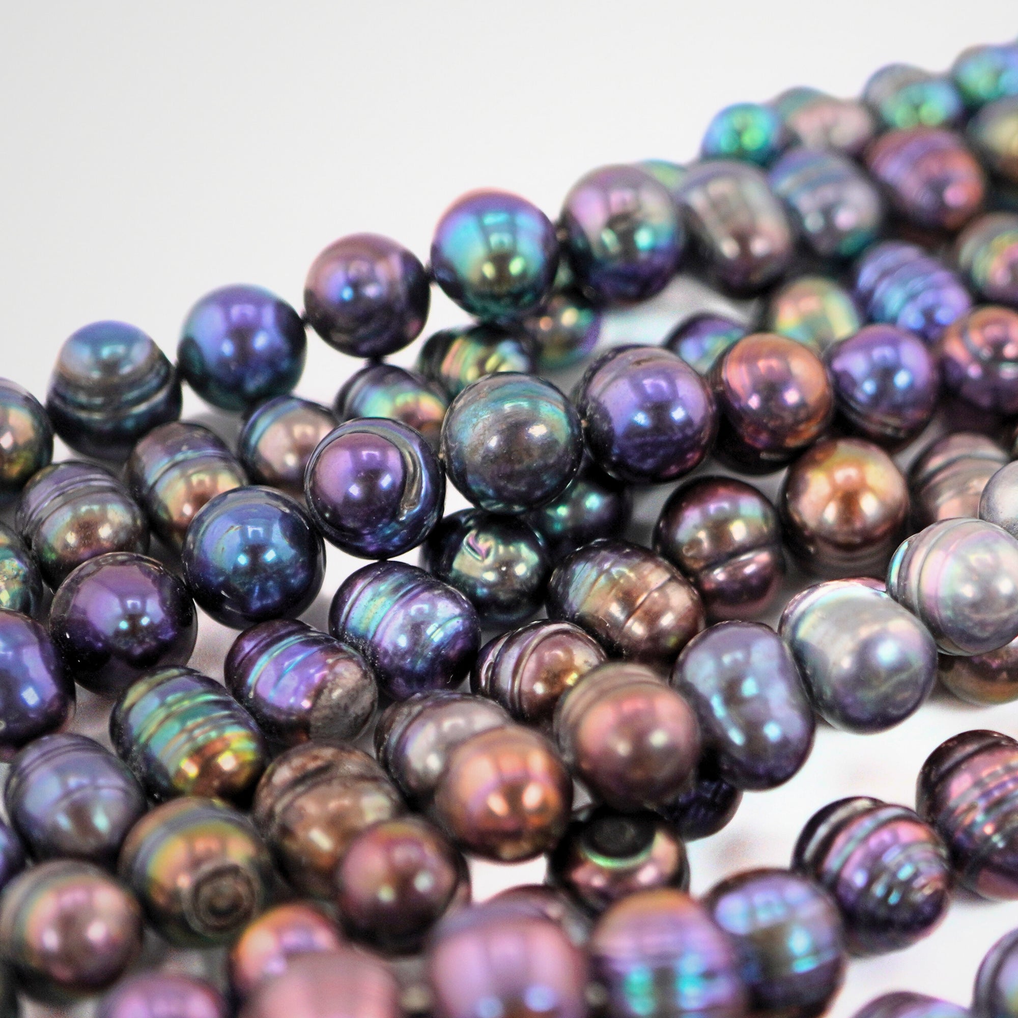 9 x 9 - 11 x 8 MM Peacock Oval Freshwater Pearls Beads