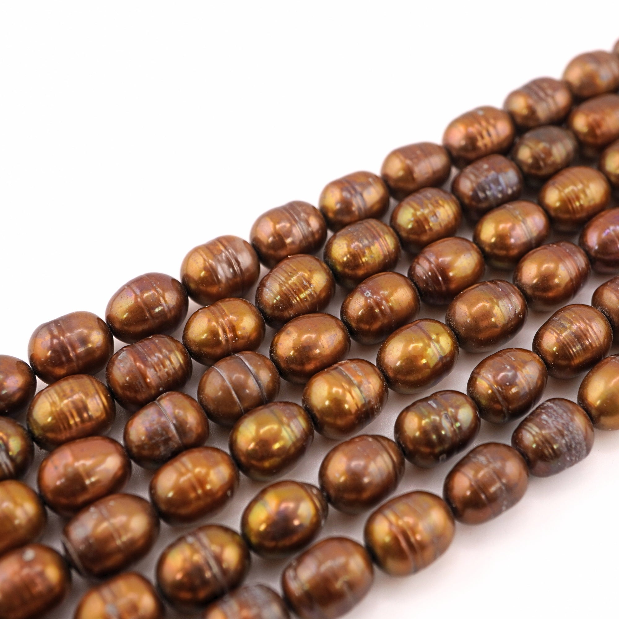 11 x 8 - 10 x 7 MM Golden Oval Freshwater Pearls Beads