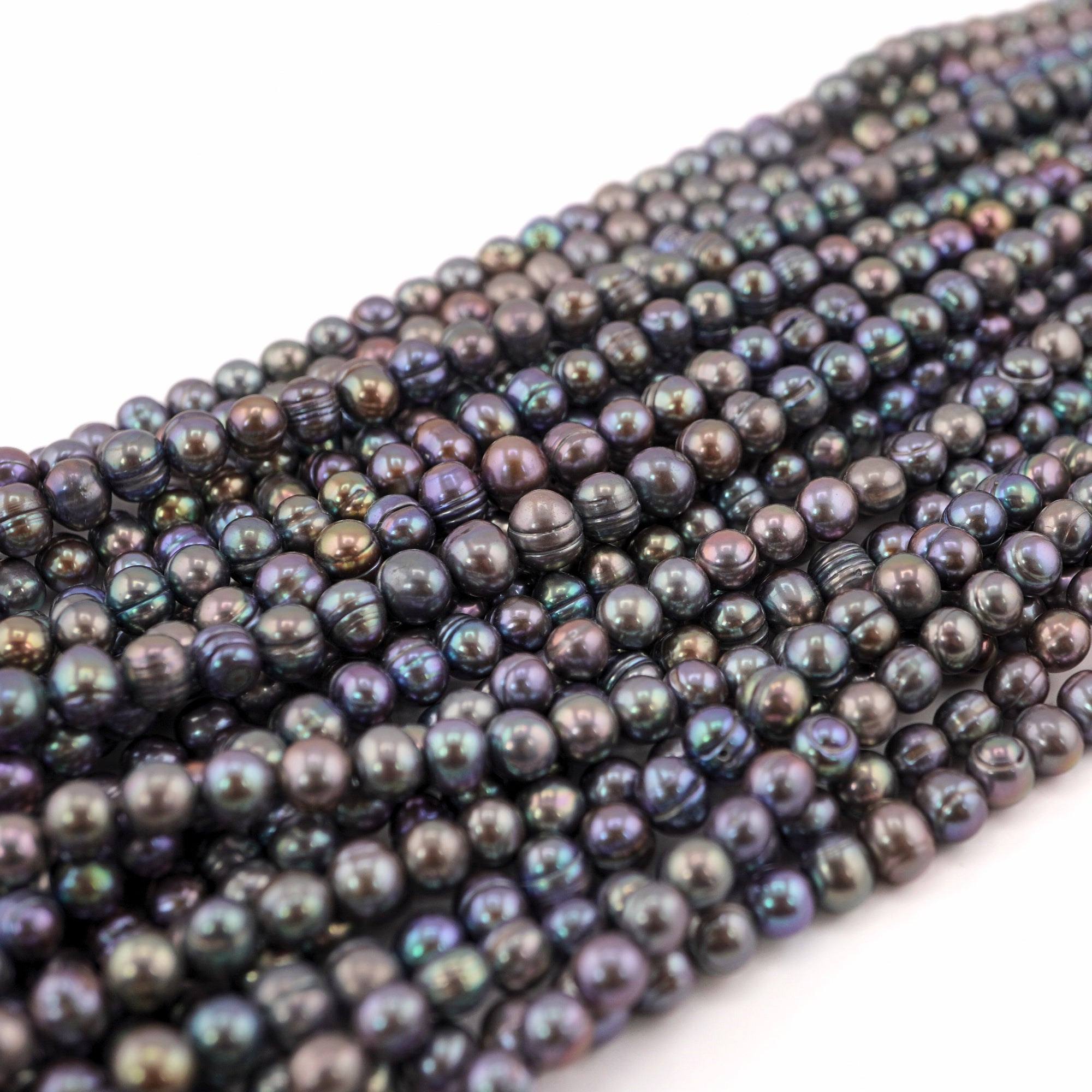 5 - 7 MM Peacock Oval Freshwater Pearls Beads