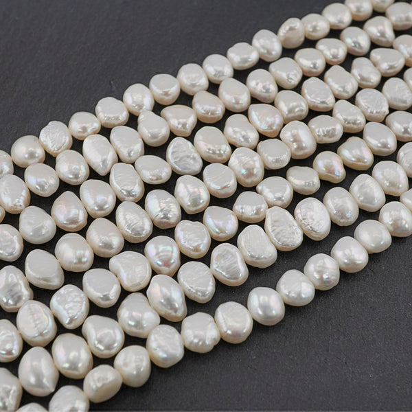 8 x 5 - 7 x 4 MM White Round Freshwater Pearls Beads