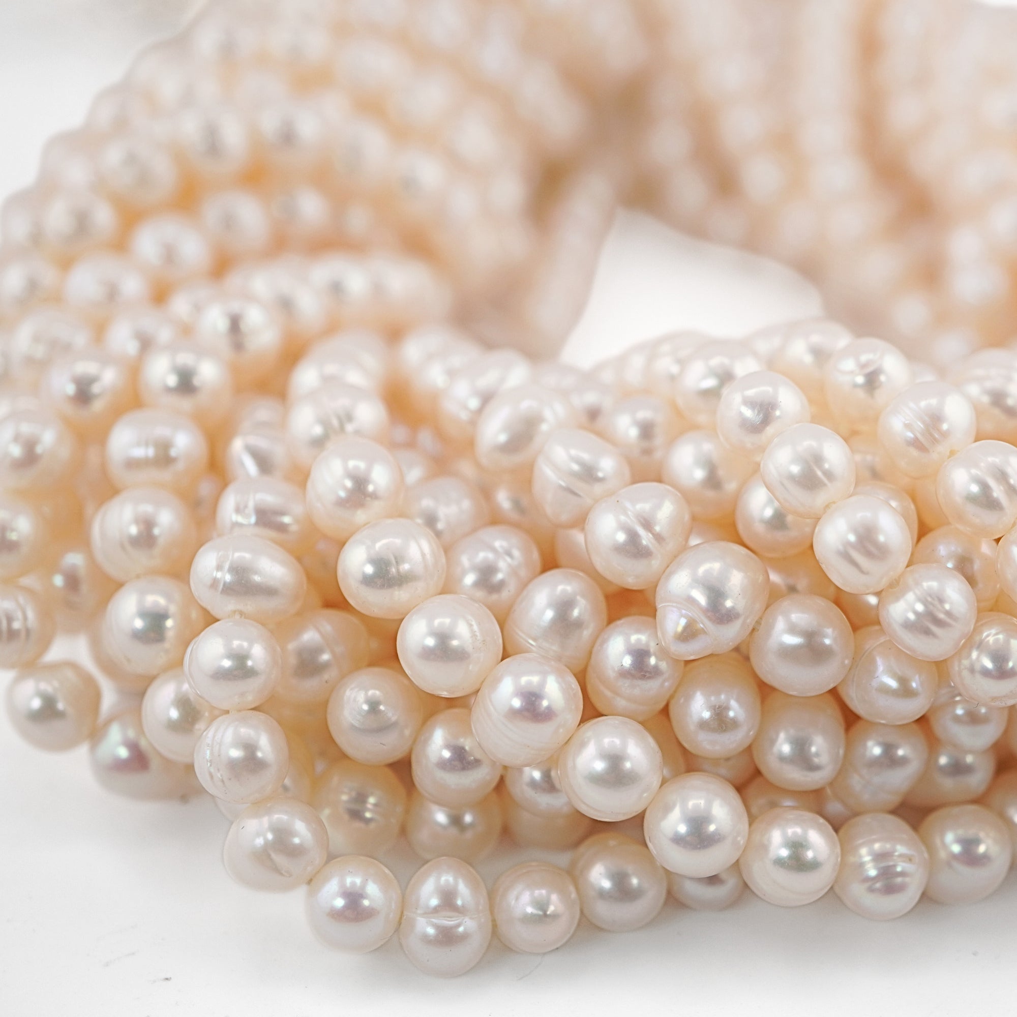 White Near Round Freshwater Pearls Beads