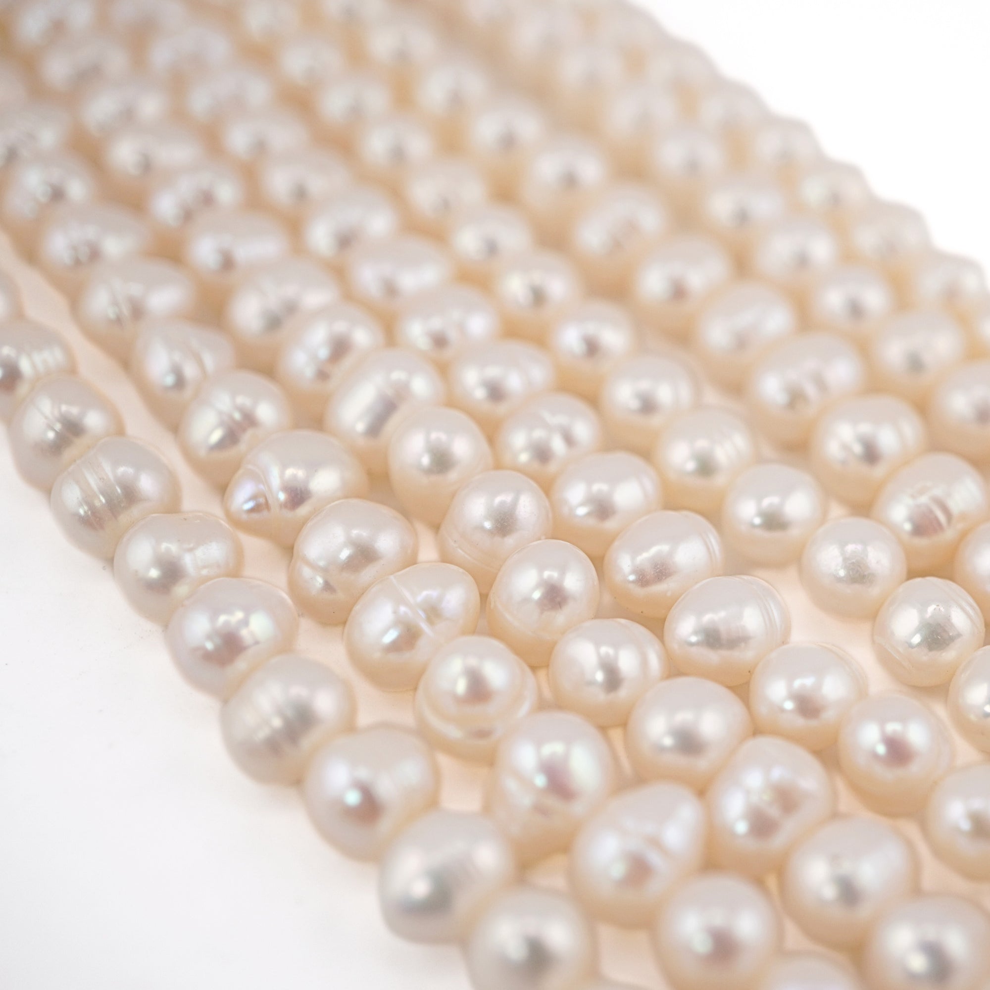 White Near Round Freshwater Pearls Beads