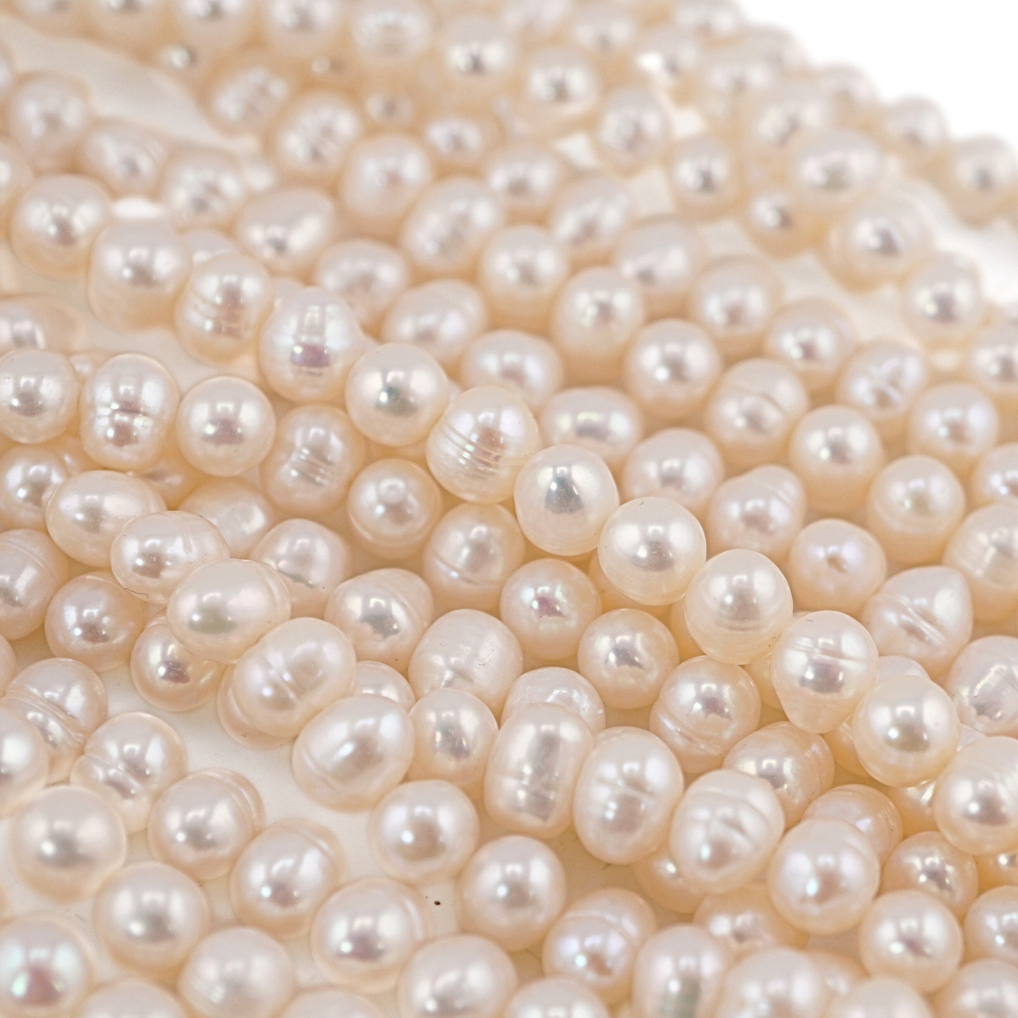 White Near Round Freshwater Pearls Beads