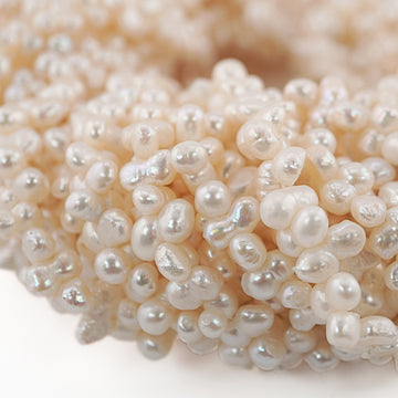 9 x 4 MM White Baroque Freshwater Pearls Beads