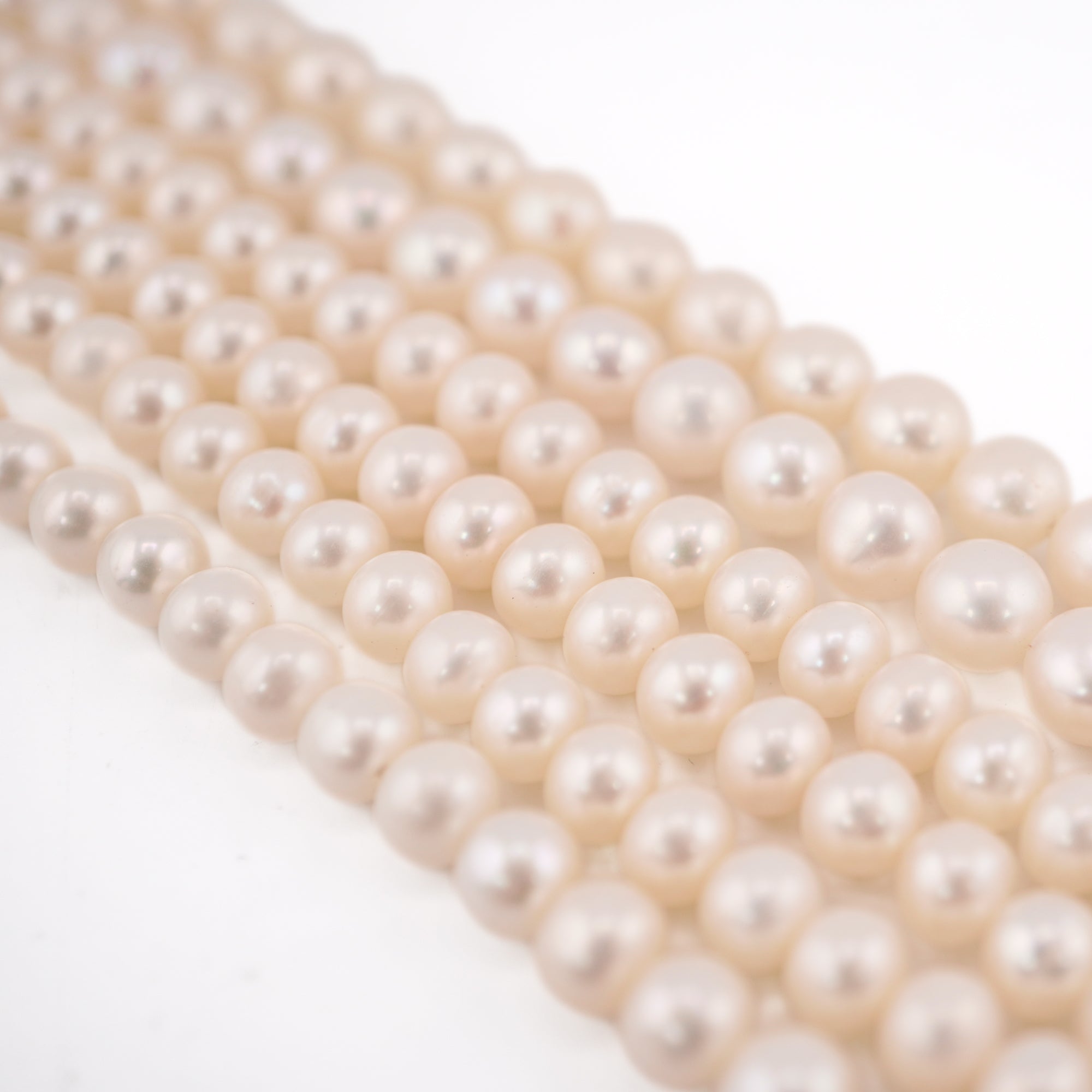 White Near Round Freshwater Pearls Beads