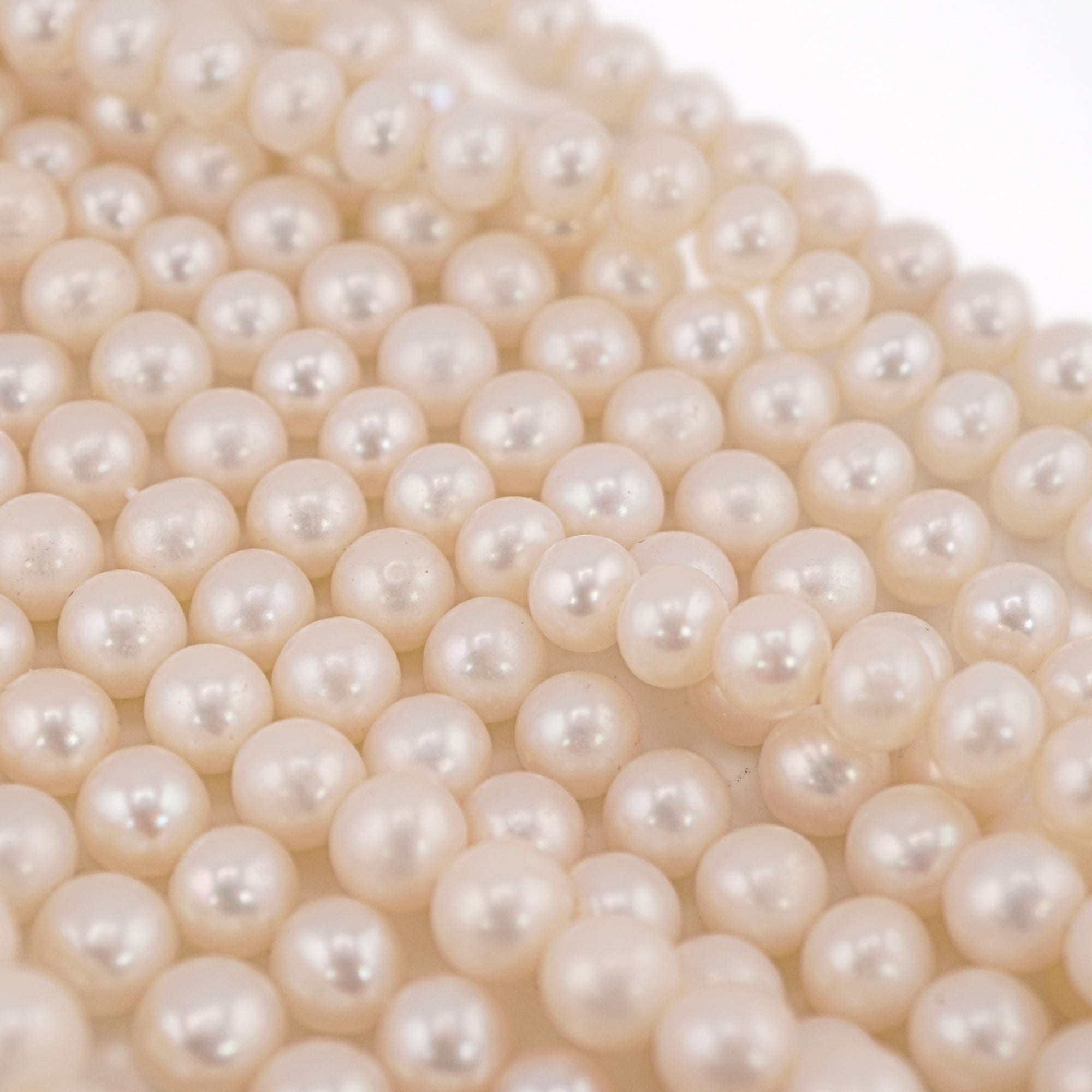 White Near Round Freshwater Pearls Beads