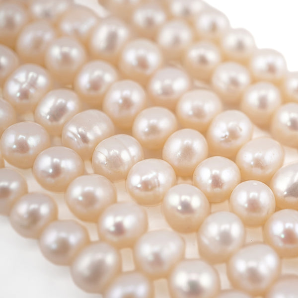 White Near Round Freshwater Pearls Beads