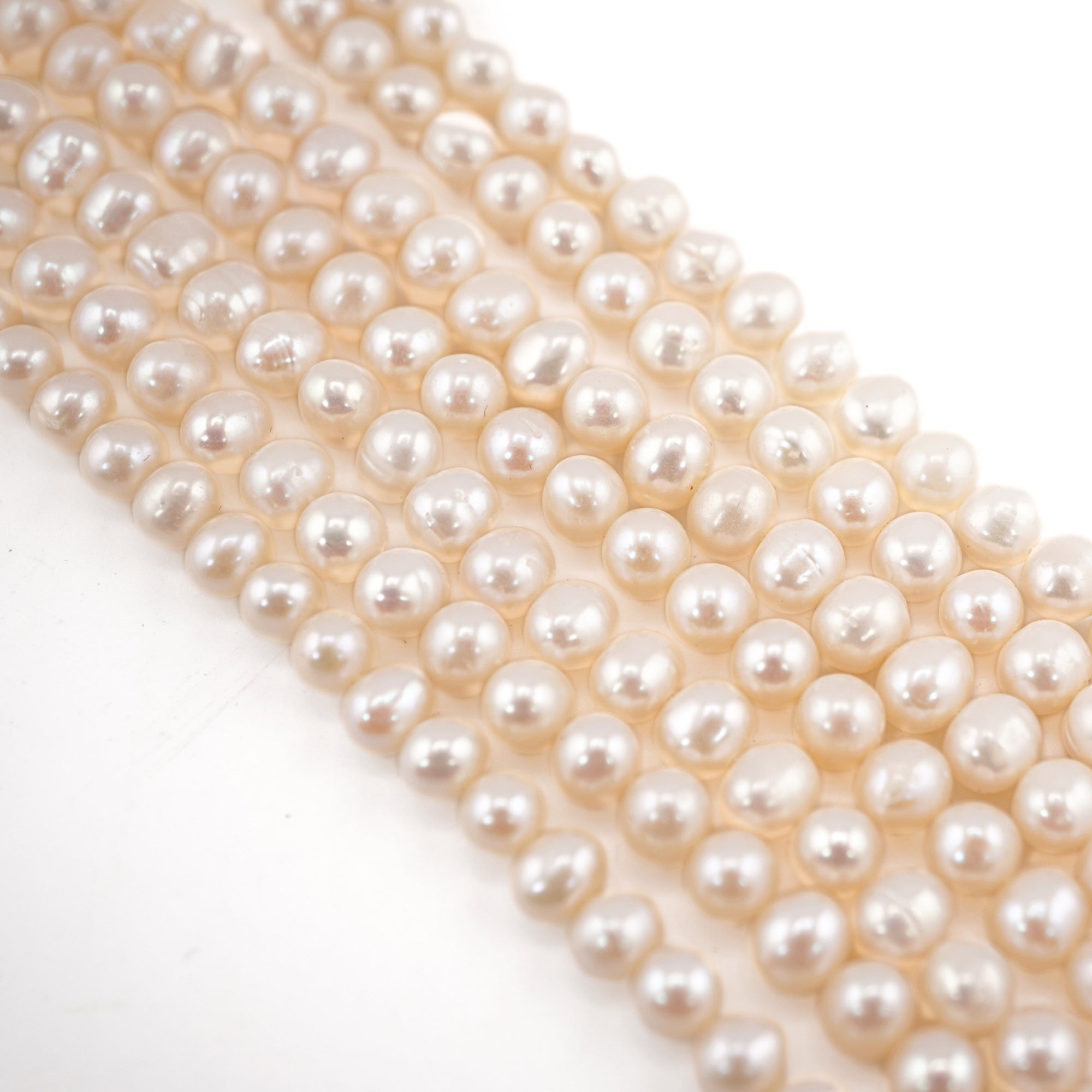 White Near Round Freshwater Pearls Beads