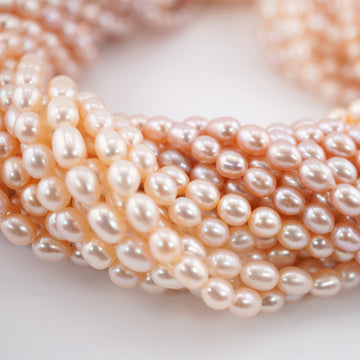 6 x 5 MM Peach Rice / Oval Freshwater Pearls Beads