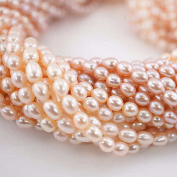 Peach Rice / Oval Freshwater Pearls Beads