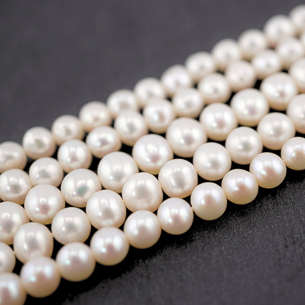 White Near Round Freshwater Pearls Beads