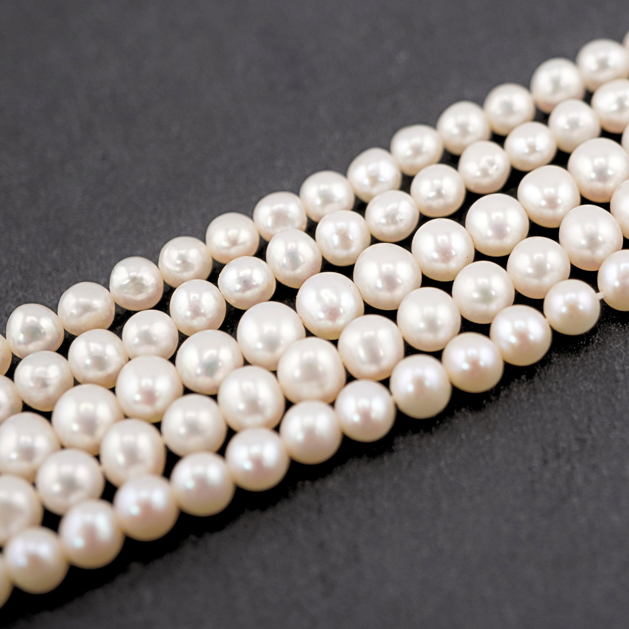 White Near Round Freshwater Pearls Beads