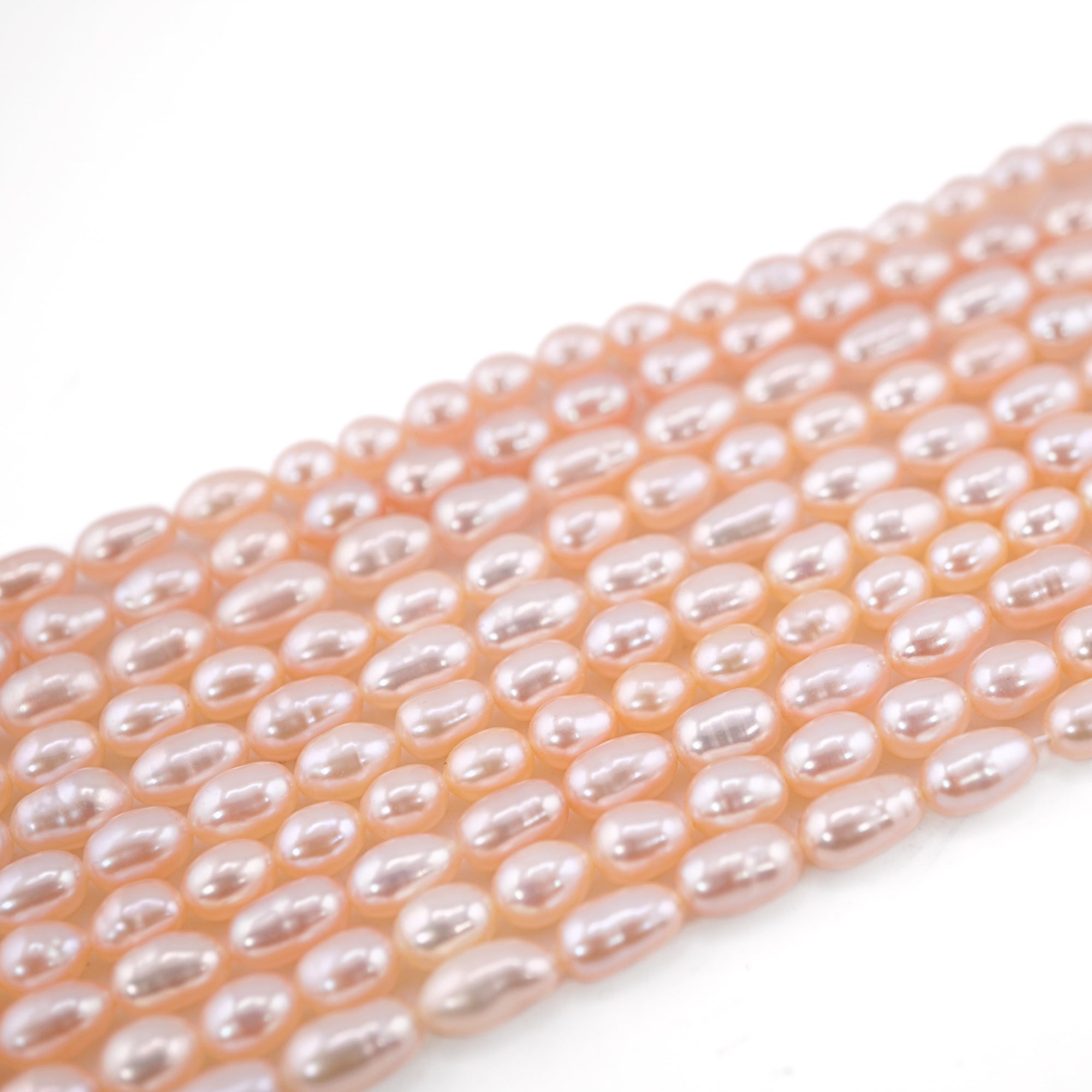 7 x 5 MM Peach Rice / Oval Freshwater Pearls Beads